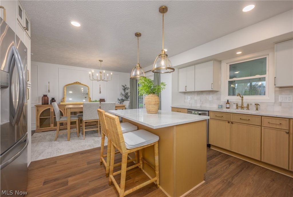 Photo of 11490 Peach Glen Avenue NW, Uniontown, OH 44685 (MLS # 5202714)