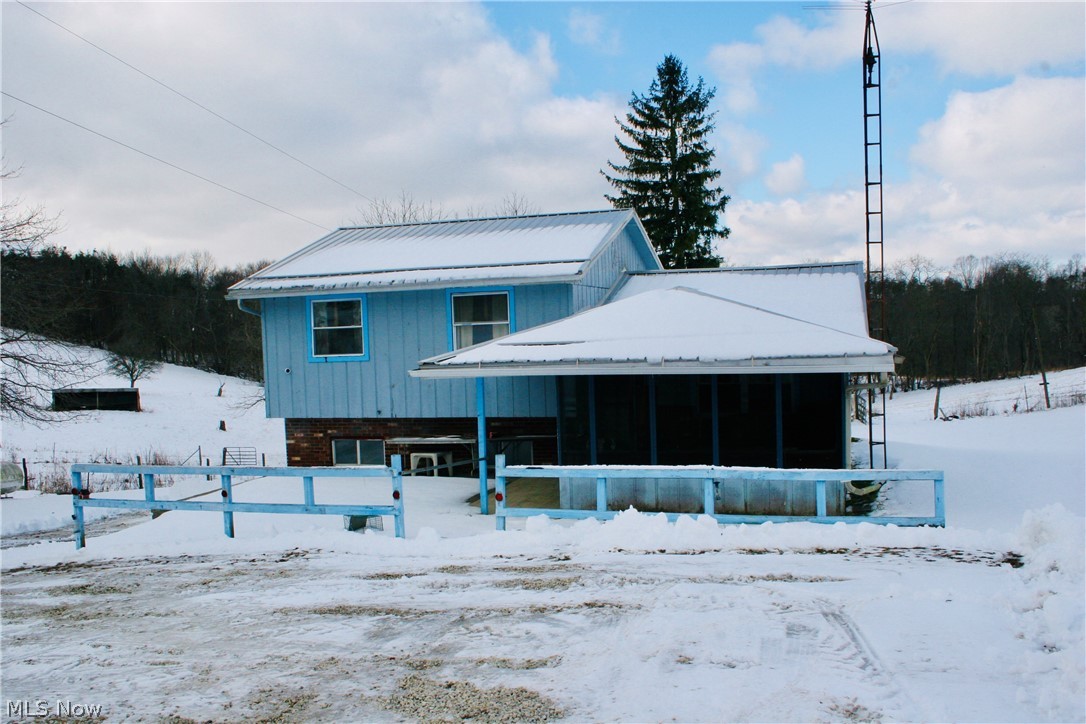 10+- acre mini-farm nestled in the hills of Carroll County. This cute 3 bedroom 1.5 bath is just 9 miles south of Carrollton with plenty of room for animals. Close to Leesville Lake. If you are looking for acreage and a place to call home, come check it out. (Property will be surveyed for 10+- acres. Taxes reflect original acreage.)