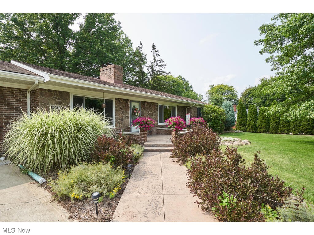 FABULOUS RANCH ON A FABULOUS LOT! Pride of Ownership shines throughout this tastefully remodeled gem! Meticulously maintained & loads of major improvements inside & out! Refreshing exterior boasts newer brick, vinyl siding & porch! Sprawling 1st floor layout showcases gleaming hardwood floors, 2 cozy fireplaces & built-ins in the vaulted great room & inviting living room. Eat-in kitchen w/ breakfast bar, pantry, ceramic tile floor & backsplash. 3 spacious bedrooms w/ hardwood floors. Full bath w/ ample counter/cabinet space & a beautiful ceramic tiled shower. Foundation completely waterproofed. Insulated top to bottom. Heated 22x21 garage w/ newer concrete floor, hot & cold water, electrical & dry wall. Stamped concrete patio & front & side stamped walkways. Entertain or simply relax in the beautifully manicured & landscaped, 1 acre park like yard. Amazing space for storage or workshop in the 20x22 outbuilding. Full basement w/ bath rough in. All that's left to do is to move right in!