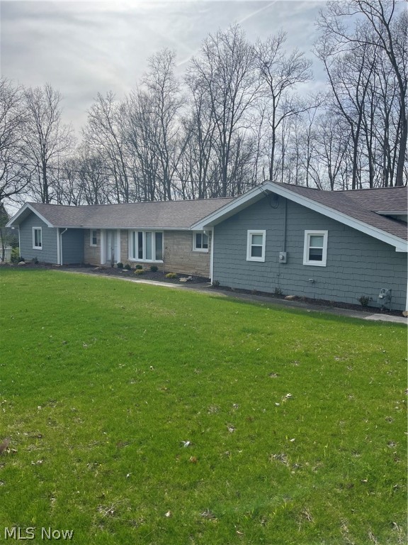 WOW ! Completely Remodeled and Move-In Ready 4-Bedroom Ranch on Nice Size and Scenic Lot ! Updates Include Gorgeous Kitchen Countertops and Cabinets, Stainless Steel Appliances, Lighting, Floorings, Laundry Room, Bedrooms and Both Bathrooms ! Many More Interior and Exterior Updates ! Call for Easy Showing !