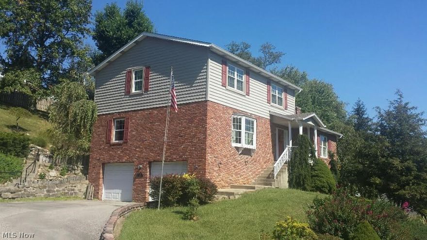 You'll love the view of this nicely updated home, 3 bed, 2.5 bath, 2351 sq.ft.  Newer roof, siding, windows, kitchen with granite, bathroom.  Private 2 lots at end of road with 2 car garage and beautifully landscaped.