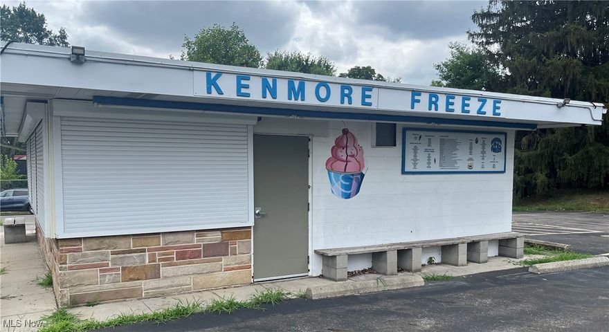 Prime commercial property located on a neighborhood corner of Akron.  Your future business is just an offer away.  This food stand that operated as an ice cream stand is new on the market just in time for you to be serving up cones to neighborhood children and families by this spring. Included with the sale is all the equipment that is needed to operate as a ice cream/food stand.  The building sits on nearing a half acre paved lot, giving you plenty of space to host the big crowds you can expect due to the school and baseball park located just across the street.  All appliances and equipment are included. Updates include: electric, stainless steel counter tops, windows with hurricane shutters, flooring, paint, security system and an advertising sign that has a customized imagery system. Don't miss out on this amazing opportunity to own this turn key operation that is sure to be money in the bank. Schedule a private tour today!