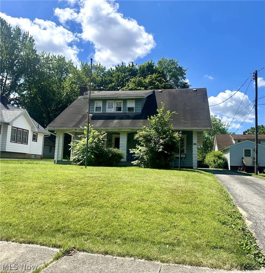 View of front of property with covered porch
