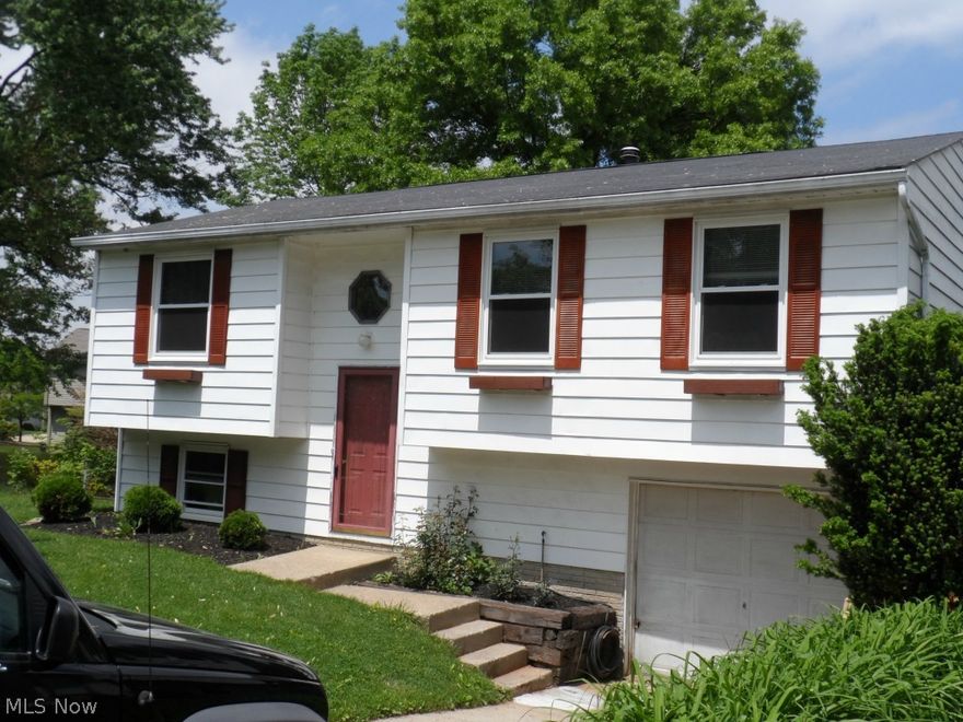 Beautiful Bi-Level nestled on a quiet street. Large lot with mature trees and fence. (One of the largest on the street).  This home includes 3 bedrooms and two full baths.  The finished lower level includes a large family room with full bath.  Nuetral decor throughout.  Minutes from the square.  Well maintained. All appliances included. Call today for a showing.