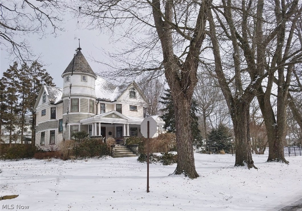 Spectacular Genuine Queen Anne Painted Lady! Beautiful stained glass and leaded windows, carved woodwork, butlers pantry, pantry doors, awesome wood floors, 2 walk-in glass showers, modern kitchen and baths, amazing turret and staircase. Slate roof, ornate gutters, wrought iron fenced yard, carriage house. This one of a kind home sits on a double corner lot of a maple tree lined street. Walk to town!