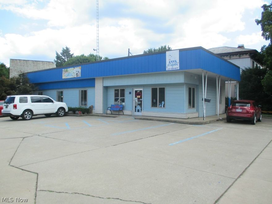 2,437 square foot office/commercial building.  Excellent location, close to downtown.  Large conference room and offices all on one floor.  Excellent condition inside and out.  Updates include carrier gas furnace with central air, roof resealed (August 2011).  Plenty of parking.  Prime location off East High Avenue at the intersection of State Route 39.  High visibility.  Rear portion (with separate heat and air) could be leased for additional income including 2 office, storage area and restrooms.