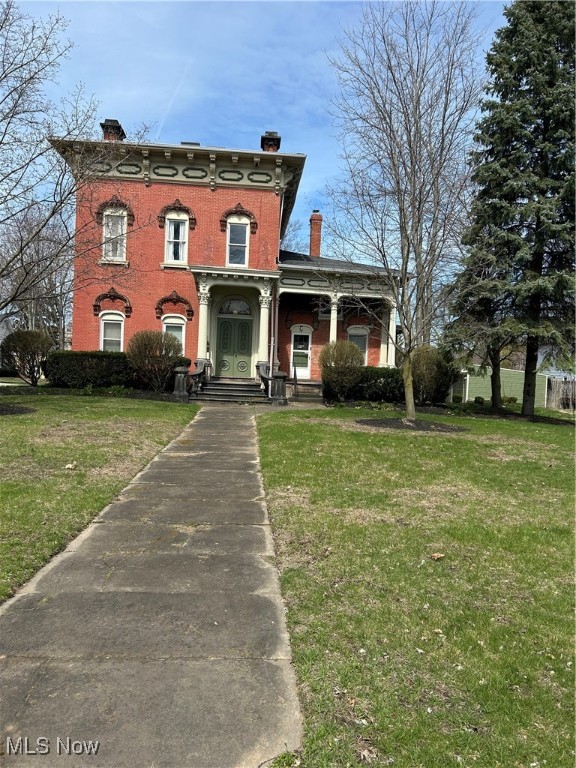 This beautiful 6 unit all brick apartment house featuring 3 two bedroom and 3 one bedroom units, all with tall ceilings and spacious layouts. New windows installed in 2010, new furnaces for each unit in 2014. All units have a garage with opener and electricity paved floor. There is one additional parking space per unit on paved parking lot. Each unit has access to basement storage area that is accessible from inside the building. All utilities are metered separately. The owner pays for trash removal. The carriage house is a 40' x 30' two story building with 8' 4" sliding door and a 18' x 24' attached garage with a opener. Make sure to have your agent set up your appointment to visit this Historic Gem! Bus stop in the front of the property, and walking distance to Lake Erie College. Easy access to the freeway for those commuting to work.