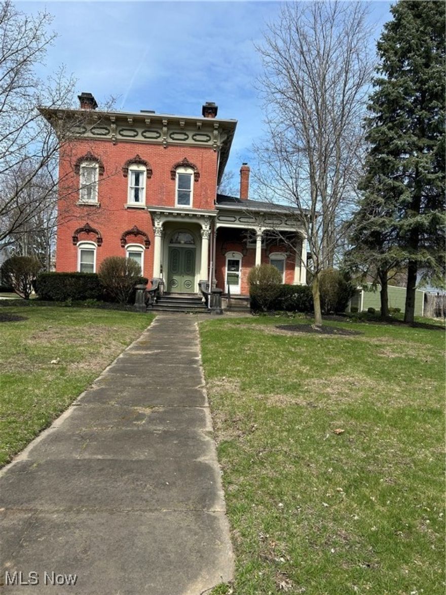 This beautiful 6 unit all brick apartment house featuring 3 two bedroom and 3 one bedroom units, all with tall ceilings and spacious layouts. New windows installed in 2010, new furnaces for each unit in 2014. All units have a garage with opener and electricity paved floor. There is one additional parking space per unit on paved parking lot. Each unit has access to basement storage area that is accessible from inside the building. All utilities are metered separately. The owner pays for trash removal. The carriage house is a 40' x 30' two story building with 8' 4" sliding door and a 18' x 24' attached garage with a opener. Make sure to have your agent set up your appointment to visit this Historic Gem! Bus stop in the front of the property, and walking distance to Lake Erie College. Easy access to the freeway for those commuting to work.