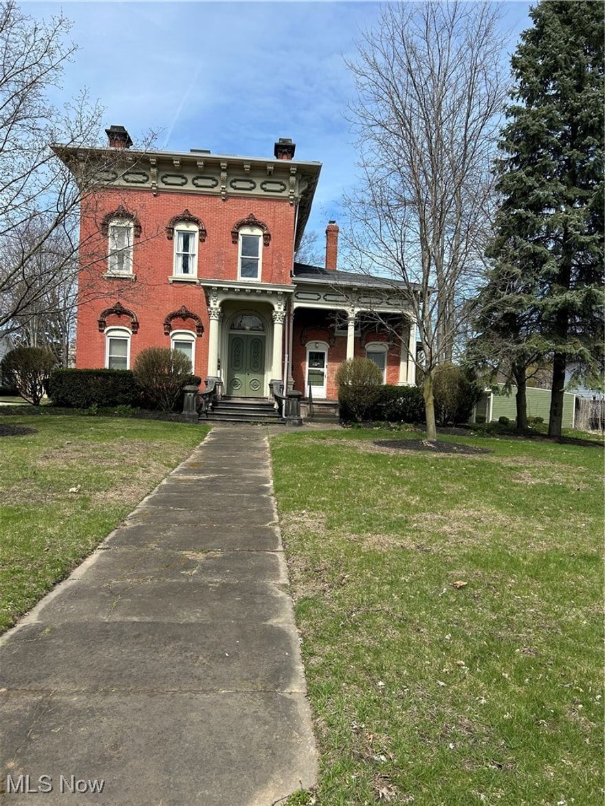 This beautiful 6 unit all brick apartment house featuring 3 two bedroom and 3 one bedroom units, all with tall ceilings and spacious layouts. New windows installed in 2010, new furnaces for each unit in 2014. All units have a garage with opener and electricity paved floor. There is one additional parking space per unit on paved parking lot. Each unit has access to basement storage area that is accessible from inside the building. All utilities are metered separately. The owner pays for trash removal. The carriage house is a 40' x 30' two story building with 8' 4" sliding door and a 18' x 24' attached garage with a opener. Make sure to have your agent set up your appointment to visit this Historic Gem! Bus stop in the front of the property, and walking distance to Lake Erie College. Easy access to the freeway for those commuting to work.