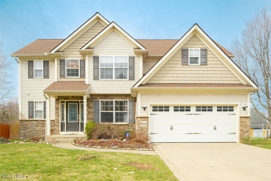 This home has had one owner and offers more space than you can imagine!  From its beautiful hardwood floors throughout the primary level, open concept design, formal dining room, half bath,  fireplace and bump out in the living room there is plenty of room for activities!  The second floor holds 4 bedrooms and 2 full baths with laundry conveniently located here as well, No hauling laundry up and down!  The primary suite is IMPRESSIVE in both size and amenities.  The on-suite bathroom has a BRAND NEW LUXURY dual walk in shower with updated plumbing, has plenty of light, mirrors, counters, and ample storage. Also attached to this suite is the walk-in closet space that dreams are made of.   Downstairs you will find ample flexible use space, which is pre-plumbed for an additional half bath ready to go and has tons of easy to finish sq footage or simply use additional storage, home gym,  organization, the possibilities! Outside you'll find a large patio, private fenced yard and a 12x10 shed (EVEN MORE STORAGE!) Great space for relaxing or entertaining. With a location near parks, schools, Lake Erie, Madison Country club, Golf and more... This beauty is a MUST see.