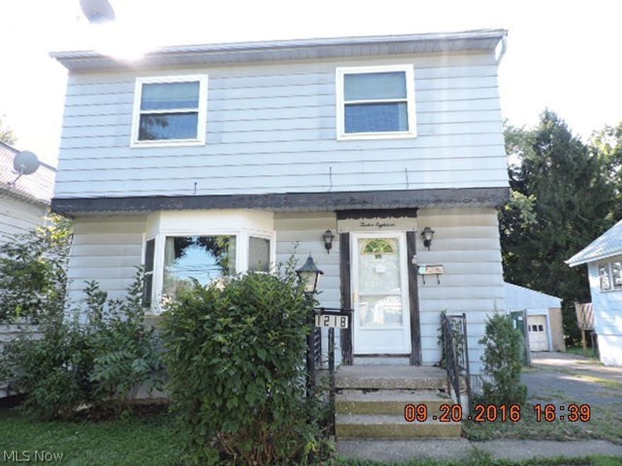 Fix this colonial up for yourself or for resale.  The neighborhood has very few homes this 'new' and there is some good upside potential with the walkout lower level.  Updated vinyl windows, kitchen cabinets, newer high efficiency Rheem furnace. Call for a private showing now!  Come see!