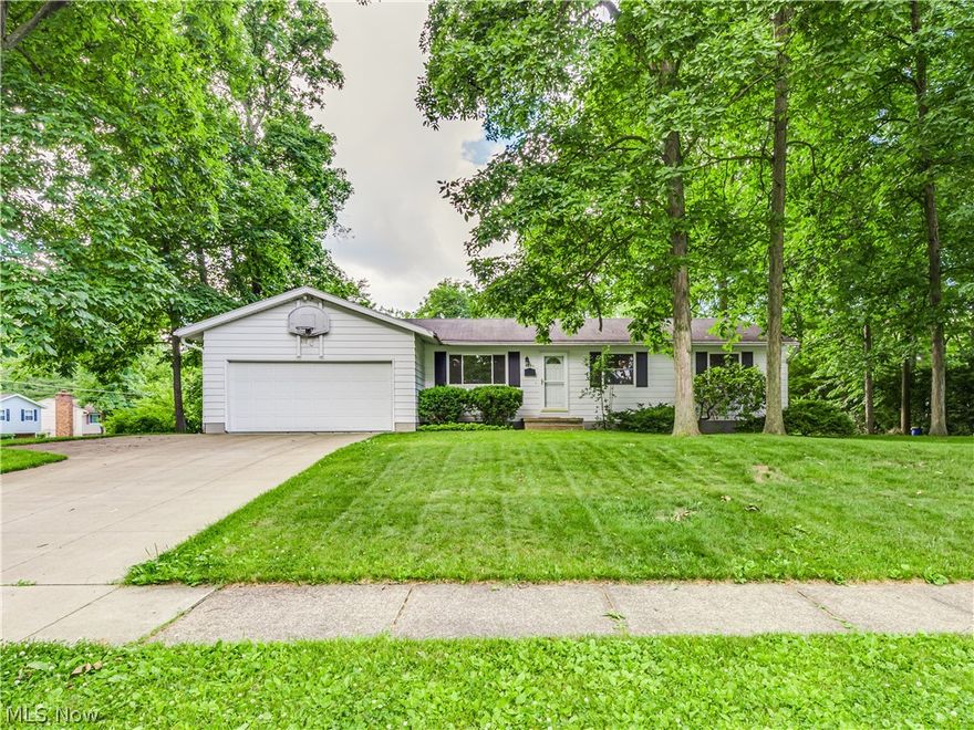 Spacious Ranch in tranquil Stow neighborhood.  Featuring hardwood flooring throughout, a large living room, kitchen with oak cabinets and all appliances, formal eating area, family room that leads to a fantastic enclosed patio, 3 bedrooms with nicely sized closets and 1 full 1 half baths.  An enormous recreation room adds to the total living area. Updates include roof (June 2020), refrigerator, HVAC (2ys),Radon Mitigation System, and windows. The oversized attached two car garage is a definite plus. You will enjoy the beautiful curb appeal that the spectacular park-like setting offers. Homes are selling fast. Don't miss out. Call for your private showing today.