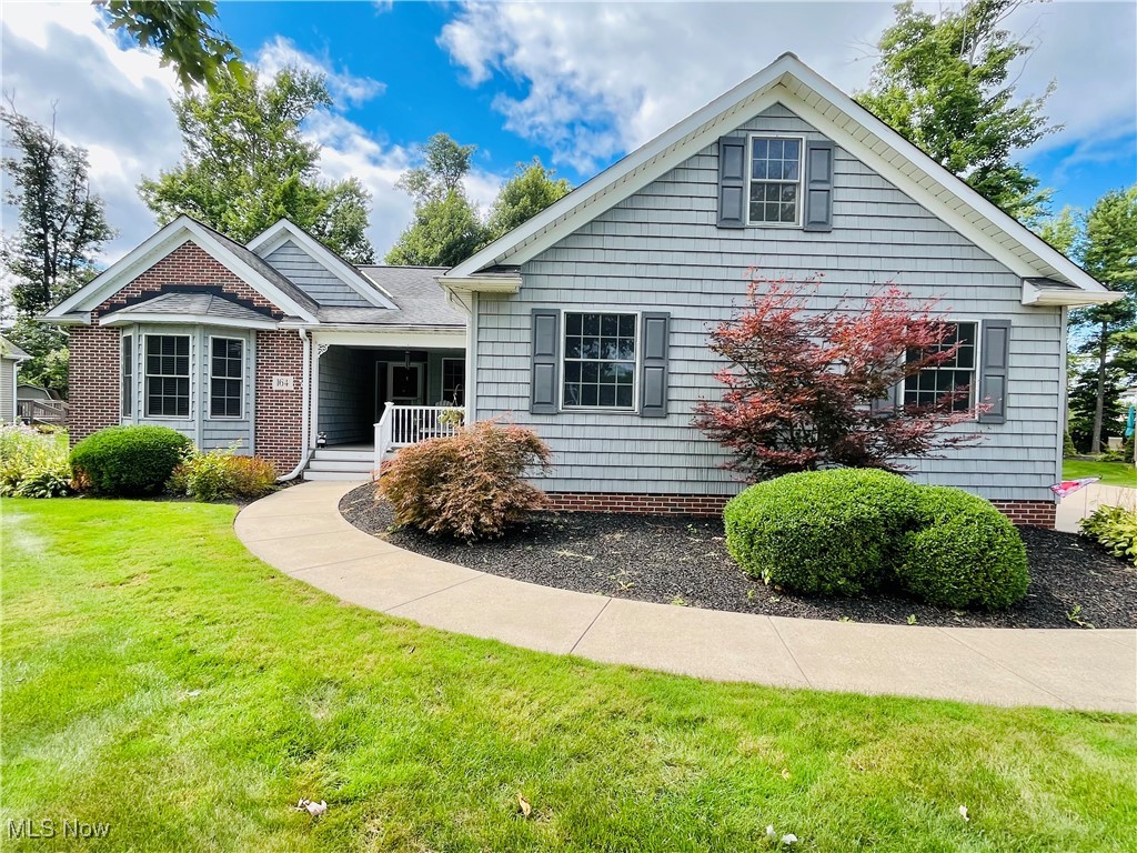 Welcome to this remarkable ranch in the Huntington Woods development of Madison Village! Exceptional details throughout this customized original owner home. Built in 2004, this home offers open concept spaces, hardwood floors, upgraded windows and doors with in-glass shades, all among high quality material selections. Certainly uncommon in the market, truly all one floor living with three beds, two baths, and laundry on the main level. Vaulted ceiling family room with gas fireplace. Private owners' suite with walk-in closet, lux bath with jacuzzi tub and custom glass and tile shower, as well as private entrance to finished three-season porch. This finished space offers vaulted ceiling, custom windows, recessed lighting, cottage paneling, and slider leading to the enormous grill-and-gathering-ready deck. From the open and dynamic kitchen, you can also access the rear Trex deck through the custom, weighted wood door with in-glass shades. Quality marks bound throughout. Gazebo and a lush glade of a backyard. Small fire pit area is a quaint gathering space beneath the trees. Full footprint basement has 23x16 finished craft or hobby room - also a large workshop area with utility sink, plenty of storage, and easy walk-up to garage. Amazing detail all around. Recent upgrades to mechanicals. Irrigation system on separate water meter. Generac generator! Walk to town for events throughout the year. Close to shopping, restaurants, YMCA, parks, and highway. Do not miss this rare gem!