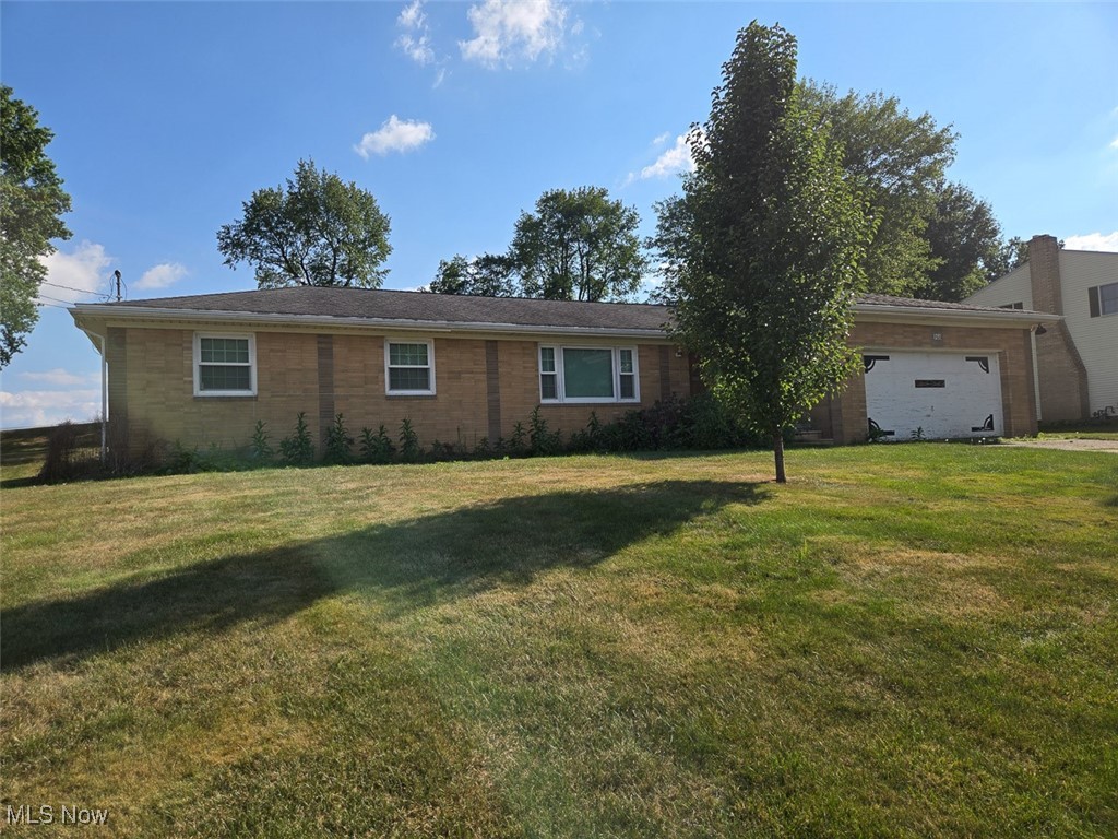 Brick Ranch On 1/2+ Acre Ready for Renovation Completion. Springfield Twp., Springfield LSD. Live Auction with Online Bidding Available. All sells to settle the Gerald Serdinak Estate, Summit County Probate case #2024 ES 01083, on location. ONLINE BIDDING BEGINS MONDAY, SEPTEMBER 22, 2025, at 12:00 PM, and AUCTION LIVE ON-SITE BIDDING WILL BEGIN THURSDAY, SEPTEMBER 25, 2025, at 12:00 PM. Spacious brick ranch built in 1965 with 1,548 sq. ft. of living on a .61-acre lot. Main level features open concept kitchen & family room, large living room, dining room, 3 nice-sized bedrooms, full bath & half bath. Hardwood flooring throughout much of the main level. Full basement w/ laundry, gas F/A furnace, central A/C & breaker electric. The basement has been waterproofed. Attached two-car garage. Well & sewer. Parcel #5103395. Half-year taxes are $1,969.74. Convenient location with easy access to shopping, restaurants, and the highway. Perfect for investors, contractors, or homeowners looking for a renovation project. This home has been partially renovated and is ready for your finishing touches to make it your own! The home will be open for viewing on auction day, starting at 10:00 AM.