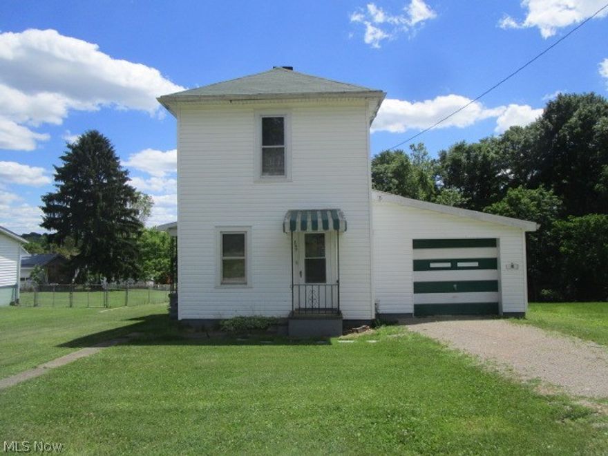 Franklin Local Schools Well Up Dated 2 Story Fully Applianced ( Range, Refrigerator, Washer, Dryer ) With 2 Large Bedrooms, Side Covered Porch, Large Rear Yard for Play Area or Garden, Storm Windows, Up Dates As Follows: New vinyl siding, New Flooring in Kitchen & Bath, All New Carpeting in Dining, Living Both Bedrooms , Hall & Stairs, Bath Updates Include adding a Shower & New High Rise Water Closet, Main Floor Laundry, New Paint & Window Blinds, New Storm Door & Roof, This Home is Super Clean And Move In Ready !!!  Note Could Have Additional Bedroom On Main Floor.