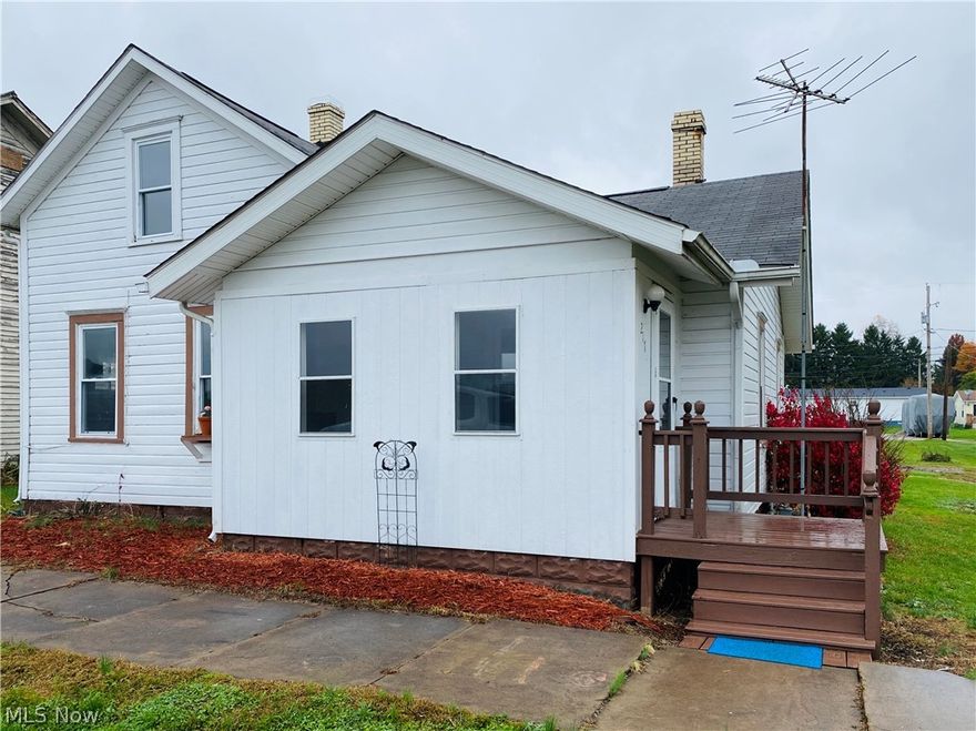 Cozy 2 bedroom home in move-in condition! Spacious eat-in kitchen with appliances including washer and dryer. Refinished hardwood floors in the living room and sunroom to go along with the beautiful wood work. Sunroom has sliding glass doors that lead out to a nice deck. To much sun ? Not a problem with 
 SunSetter retractable awning attached. First floor bathroom. New hot water tank. Replacement windows through-out. Furnace has been cleaned and checked by Festi Heating and Cooling. Great space outside with shed. Plenty of room to build that garage, Parcel # 5200180000 is 40x180 and Parcel # 5200179000 is 20x180. Move in before the Holidays!
Cheaper than rent!