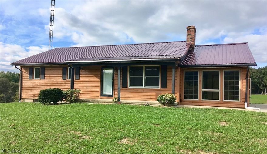 Attention Nature and Hunting Enthusiast! 31+ Acre Retreat with Log Sided Home Overlooking Lake! 24'x36' Shop Building – Three Stall Carport/Pavilion - Three Mobile Home Income Rentals – Open and Wooded Land - 1986 log sided ranch home comprising 1456 sq ft on main level. Eat-in oak kitchen, living room, three bedrooms and full bath. Full walkout basement w/approx. 1000 sq ft finished area w/ kitchen, family room, bedroom and full bath w/jacuzzi tub. 200 apm electric, fuel oil boiler heat and central air. Enclosed porch w/ wood burning stove and storage room. 12'x26' deck overlooking 2+ acre stocked lake. Three stall carport/pavilion and 24'x36' shop building with lean-to. Property also has three income rental homes renting for $450 each ($16,200 annual gross income). Each home on property has its own septic system and there are two water wells. Livestock barn and fenced pasture. Loads of wildlife and nature. Call now for more information or private showing!