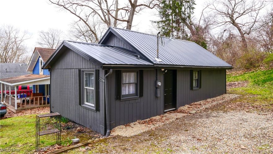 Take a walk on the lake. Come and see this charming home right next to Brady Lake and at the end of a quiet, dead-end street.