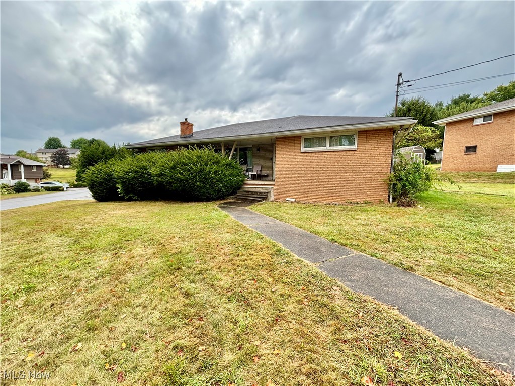 Bring your vision and unlock the possibilities with this sprawling 1,812 sq. ft. brick ranch situated on a desirable corner lot in a convenient Weirton location. Offering 4 bedrooms and 2.5 baths, this home provides plenty of space to make it your own. The layout includes a first floor laundry for added convenience, sun room, and an enormous integral garage with room for multiple vehicles, storage, and a workshop. With its solid structure and classic design, this property is ideal for the savvy investor or the first-time buyer ready to add personal touches. Enjoy quick and easy access to US-22, schools, and shopping. A true opportunity to create your dream home in one of Weirton’s most sought-after areas!