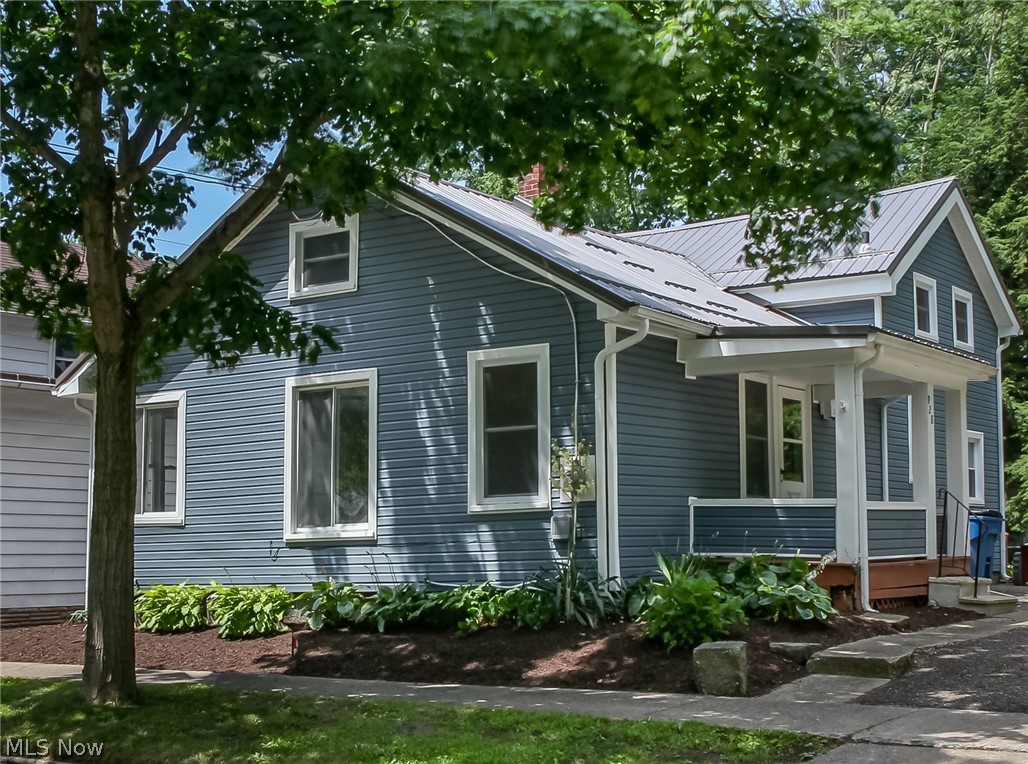Are you looking for a move-in ready home in Kent City Schools? Look no further! This 4 bed, 1 bath home has been completed renovated top to bottom. Updates include new metal roof & gutters (2019), siding (2019), furnace (2020), & windows (2019). The main floor features the kitchen, great room, remodeled bathroom, and two spacious bedrooms with new LVT flooring throughout. Upstairs you will find 2 additional bedrooms! Step outside to find a covered side porch and back deck with a large storage shed with new roof (2019). Kitchen appliances to stay with the home and immediate possession available. All the major work has been done for you! Local amenities include Plum Creek Park, Kent Plaza Theater, Kent State University and just minutes away from downtown Kent. Don't wait call to schedule your private showing today!