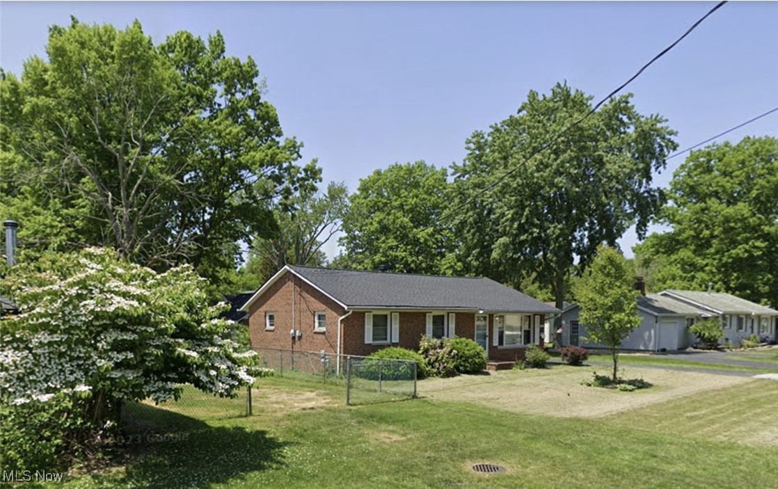 You cannot go wrong with this full-brick solid house in a nice neighborhood on the shore of the Erie Lake. This spacious ranch is in good shape and has all you need: prime location just steps from Erie Lake Shore, contemporary floor plan, plenty of space with 3-4 well-sized bedrooms, 2 car garage. Rock-solid true hardwood floors can be easily refinished to their original beauty. Newer windows, roof, and mechanicals. Open kitchen dining area concept. The house needs a clean-up and flooring update but is priced accordingly.