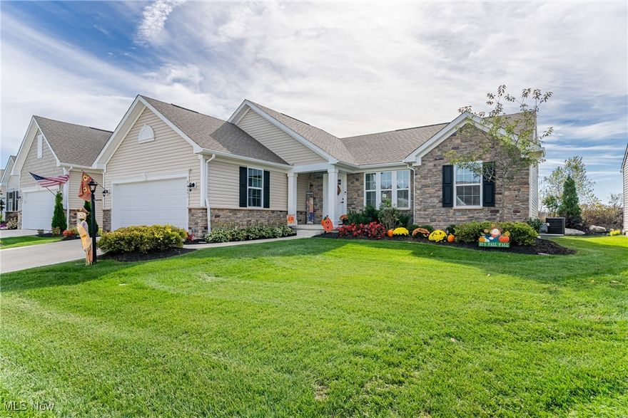 Welcome to 34691 Legends Way in Mallard’s Edge where modern style shines through. Built in 2022, this three bedroom, two bath ranch features an open layout with a sleek, designer kitchen and large island at the heart of the home. Off the main living area, sliding doors lead to a spacious Trex-style deck perfect for daytime relaxing or nighttime entertainment. The primary suite offers a private retreat, while two additional bedrooms and a full bath complete the main floor. The fully finished basement adds nearly 1,000 square feet of extra living space which is perfect for a rec room, home office, gym, or entertainment area. Modern construction, conveniently next to Mallard Creek Golf Course and stylish finishes make this home a rare find in Grafton.