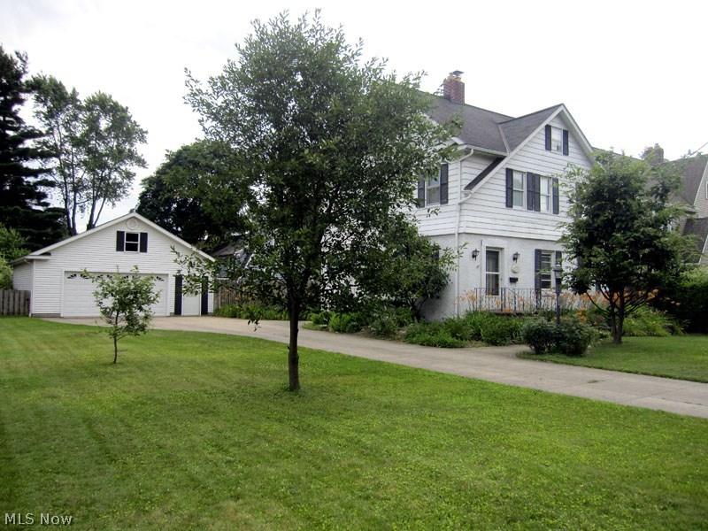 This is a well maintained and absolutely charming century home with important updates. There are two "side by side lots making for a great curb appeal. The newer oversized garage has actually housed for 4 cars and watering gardens. There's hardwood floors throughout, including the kitchen. The huge country kitchen has a free standing pantry unit that stays with the property. This seller added central air in 2014. Seller also added French doors in dining room that leads to incredibly beautiful back yard. The yard is completely fenced and the gardens are charming and have a Zen feeling. The furnace was replaced in 2016. There is an unbelievable 3rd floor that could be the master bedroom. This owner uses mostly for crafts. This property is loaded with storage and is in the perfect location in the Falls. Enjoy Cuyahoga Falls utilities and amenities. The home comes with 1 year warranty with America's Preferred.