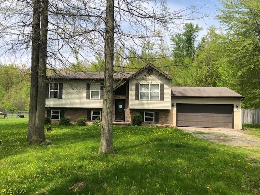 This home sits on a nice wooded in Champion Township. This has 2-floors, deck, 4-bedrooms, and 2-full baths. This home needs work to bring  it back to it's full use. The price is right to make it one of the properties you want to look and see. There has been water and mold a "Hold Harmless" letter must be signed before showing. During a selling events there is a 5% or $2500 whichever is greater buyer premium to be paid by the buyer.