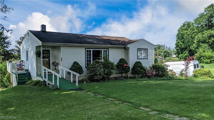 PLEASANT GROVE!!  VERY AFFORDABLE 3 bed, 2 bath Ranch Style home with a finished lower level in a WONDERFUL COUNTRY setting!  This home offers a handicapped ramp in the front and a LARGE DECK and SWIMMING POOL in the back yard! Let the summer fun begin!!  Inside... the kitchen features plenty of cabinet and counter space, dining room, and COZY living room. DON'T DELAY... CALL TODAY!!