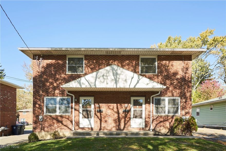 Clean and move-in ready brick townhouse-style twinplex in Kenmore! Each unit is 2BR 1BA w/ separate basements for laundry. The building features central AC, waterproofed basement, vinyl windows and sliding doors, newer flooring throughout, one updated kitchen, separate gas and electric meters, lots of private parking & paved patio area, and kitchen appliances in both units that stay! This is an excellent opportunity for an owner occupant or investor! Conveniently located a 1-min drive to I-76/77 and a 5-min drive to downtown Akron / University of Akron.