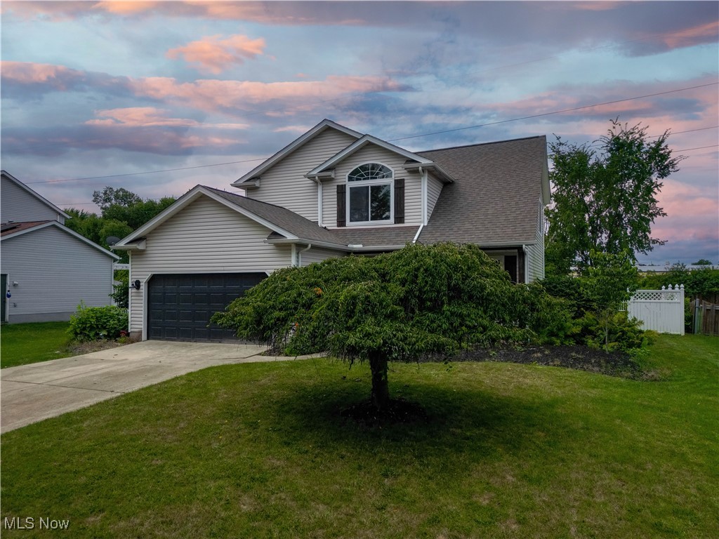 Beautifully updated home with modern amenities and luxurious touches. Step into this stunning, move-in ready home filled with quality updates and thoughtful design throughout. Recent improvements include new windows, doors, furnace, A/C, hot water tank and sump pump along with a newer roof and gutters with gutter guards for peace of mind.
The main level boasts an open layout, ideal for entertaining, with a dramatic architectural feature in the dining room that adds character and charm. The chef's kitchen is a true showstopper- featuring sleek quartz countertops, new cabinetry, a center island, and a walk-in pantry. The spacious living room is warmed by an elegant electric fireplace, while the convenience of first-floor laundry and a 2 car garage adds everyday ease. Upstairs, all three bedrooms offer vaulted ceilings for a spacious, airy feel. The master suite is a true retreat with a large walk-in closet and a spa-inspired en-suite bathroom. Pamper yourself in the wet room complete with a rainfall shower and a deep soaking tub. The finished lower-level rec room provides the perfect space for a media room, playroom or gym. With modern updates, stylish finishes and thoughtful details throughout, this home is the perfect blend of comfort and sophistication. Don't miss your chance to make it yours!