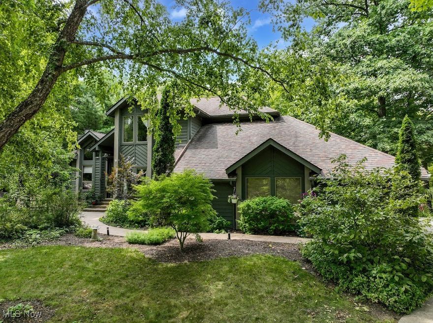 Quiet and away from the bustle, this custom home located in the beautiful Reserve neighborhood has features you don't find in other homes. From the walls of windows to the incredible property, this home has it all!  The backyard is spectacular!. Lake Medina is close by with views in the winter season. The Courtyard will become your favorite spot to relax and entertain!   Gorgeous kitchen with large island and eat in area surrounded by windows. Step outside to the stunning backyard and watch the seasons change. Finished lower level with walkout, huge Owners Suite with fireplace, beautiful hardwood floors. 3 car garage, loads of storage, and 4 fireplaces!  Lovingly cared for, this home has so much to offer one lucky buyer!  Distinguished setting for both living and entertaining.  Truly a special home.  Call today for your private showing.