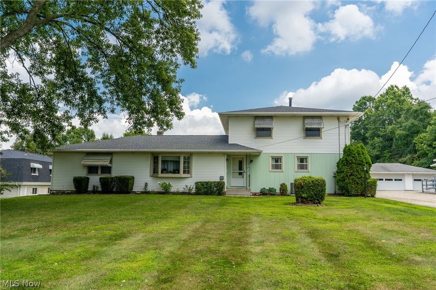 Wonderfully private and successfully rented for over 15 years.   Family gem. This home is currently designed as a two unit.   Top floor is 875 3 bed 1 bath  3rd bedroom used as laundry room with washer and dryer. Main floor unit  is 1175 2 bed 1 bath with a utility room and washer and dryer.   Basement and Garages, in addition to,  a walk out balcony on the above unit, and a sun room on the main level unit.   Both currently occupied and renting month to month at $800 each.