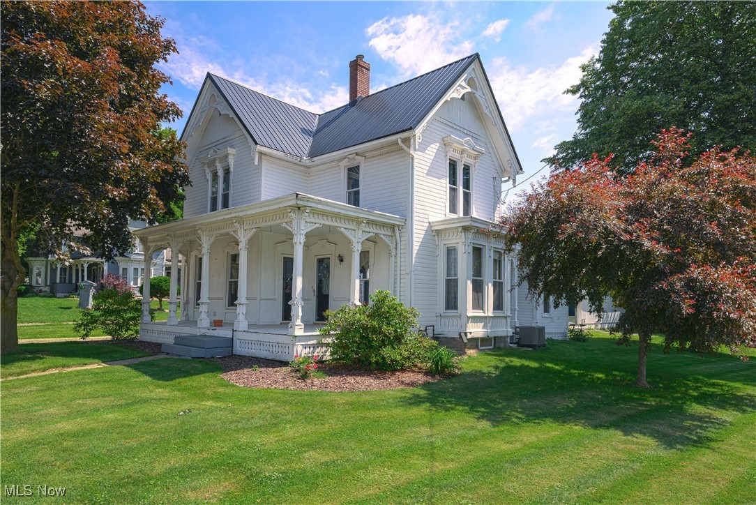 This is a rare blend of history, space, and smart updates! Step into a beautifully preserved century home where timeless character meets modern comfort. From the moment you enter, you'll be captivated by the original unpainted wood trim, rich hardwood floors, and stunning 9-foot ceilings that give the home an inviting, airy feel. Floor-to-ceiling windows bathe the rooms in natural light, and intricate stained glass transoms add a unique architectural touch you won’t find in newer homes.
This is not just a pretty face—major updates give peace of mind, including a metal roof (2020), new AC and furnace (2023), hot water tank (2024), upgraded 200-amp electric panel, and a newer well jet pump. The kitchen blends old-world charm with modern function, and upstairs, you’ll find three spacious bedrooms and an exciting opportunity: a walk-in attic space off the primary bedroom that’s already roughed in for a future bath and walk-in closet!
Outside, hobbyists and car lovers will appreciate the insulated and heated 28x36 garage/pole barn with 10-foot bump-out, 16-ft and 9-ft doors, and plenty of lighting and storage.
With updates where it counts and room to grow, this is a home that tells a story—come see how you can write the next chapter.