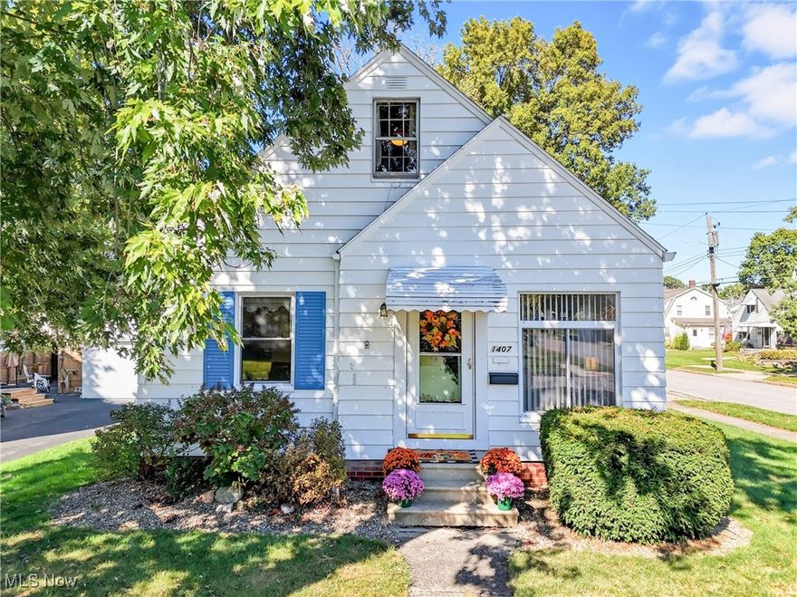 Located in the heart of Cuyahoga Falls, this charming Cape Cod is full of character and ready for its next chapter! Just a short stroll to the lively Front Street district, you’ll love being close to a vibrant mix of restaurants, shops, and entertainment. Scenic Metro Parks, hiking trails, and beautiful waterfall overlooks are also within walking or biking distance—perfect for enjoying the outdoors right in your own neighborhood.

Lovingly owned by the same family for generations, this home sits on a corner lot with a private courtyard patio next to the one-car garage—an ideal spot to relax or entertain. Inside, you’ll find three bedrooms, with two conveniently located on the main level along with the full bath. The living room flows into the dining area and kitchen, creating an open and inviting layout. While the kitchen is clean and functional, it’s ready for your personal touch and updates.

Upstairs, the large second-floor bedroom/bonus space offers endless possibilities—whether you need a private retreat, office, or playroom there is plenty of room! The lower level provides even more living space, with a partially finished basement featuring a vintage bar and half bath, plus an unfinished laundry area (washer and dryer included).

Perfect as a first home, a downsizing opportunity, or an investment property, this sweet Cape Cod has so much potential. Schedule your showing today and see all it has to offer before it’s gone!