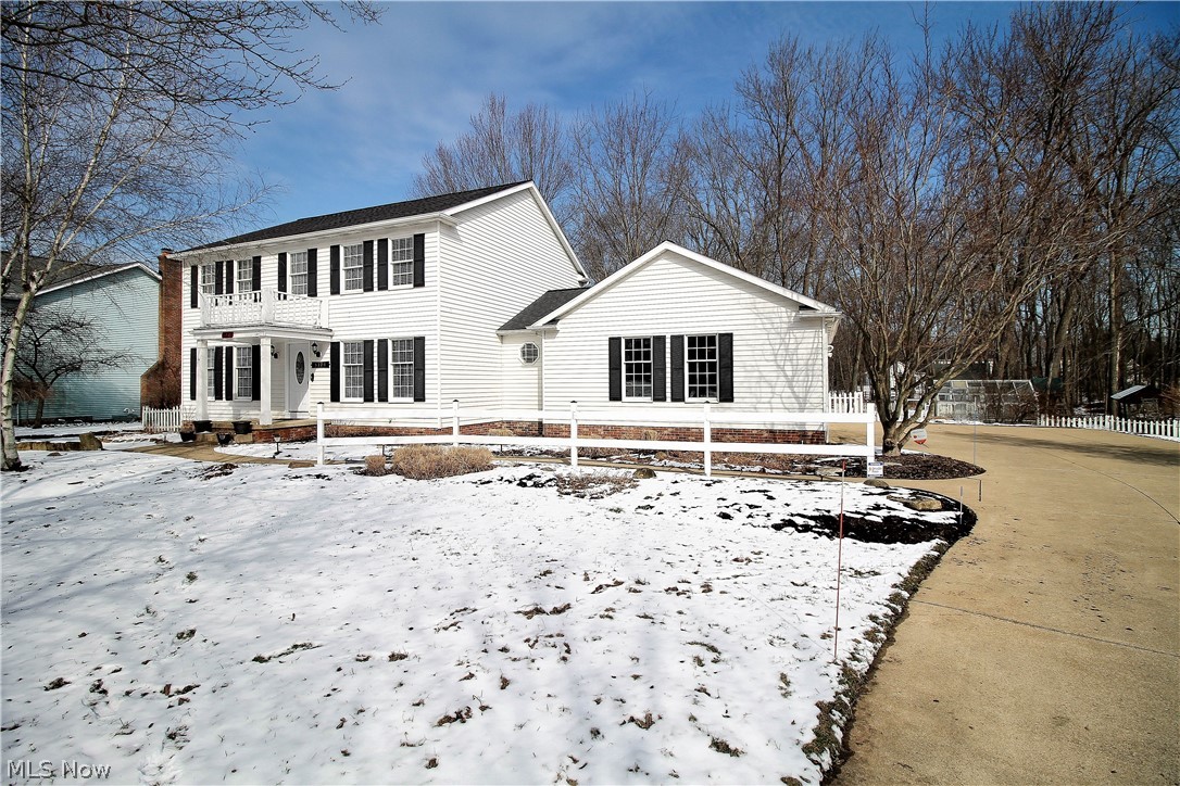 Welcome to this fabulous four bedroom, two and half bath home. The custom built gourmet chef's kitchen offers stainless steel appliances with exhaust fan, Kraftmaide soft close cabinets, coffee bar, and built in wine storage. The granite island has Penant lights and kitchen offers hardwood flooring. The beautiful family room with wood beams is open to the kitchen and has wood burning and or gas fireplace and opens to the bright sun room. The sun room has new ceramic wood type flooring 2018. The inviting foyer and dining room is located opposite the formal living room. First floor laundry room has custom built in lockers with loads of storage and coat hooks. Upstairs the master bedroom has a huge walk in closet and en-suite bathroom with new 2017 walk in shower and ceramic tile. There are three additional large bedrooms and full bathroom with two sinks and recessed lighting which completes the upstairs. The lower level has a huge finished recreation room with lots of storage space. The