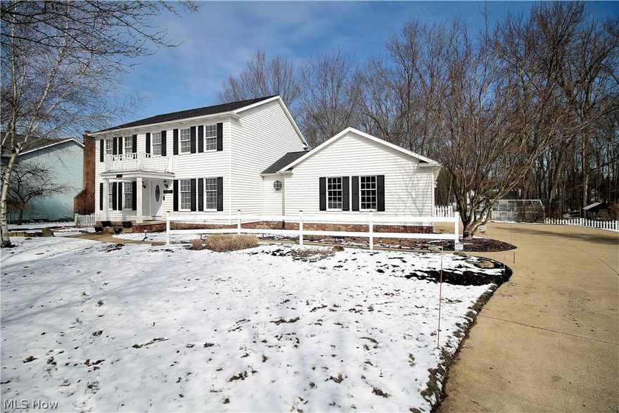 Welcome to this fabulous four bedroom, two and half bath home. The custom built gourmet chef's kitchen offers stainless steel appliances with exhaust fan, Kraftmaide soft close cabinets, coffee bar, and built in wine storage. The granite island has Penant lights and kitchen offers hardwood flooring. The beautiful family room with wood beams is open to the kitchen and has wood burning and or gas fireplace and opens to the bright sun room. The sun room has new ceramic wood type flooring 2018. The inviting foyer and dining room is located opposite the formal living room. First floor laundry room has custom built in lockers with loads of storage and coat hooks. Upstairs the master bedroom has a huge walk in closet and en-suite bathroom with new 2017 walk in shower and ceramic tile. There are three additional large bedrooms and full bathroom with two sinks and recessed lighting which completes the upstairs. The lower level has a huge finished recreation room with lots of storage space. The