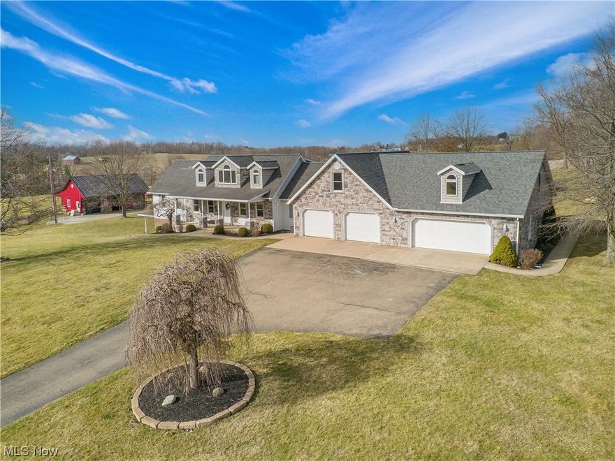 With 3.8 acres of land, a spacious 4-bedroom Cape Cod-style home, and a 2.5 acre building lot, this is a great opportunity to own your slice of countryside. The home is situated well back from the road down a blacktop driveway, offering the ultimate in privacy and tranquility. Inside, you'll find a large open living room flooded with natural light, a formal dining room, and a well-appointed kitchen with all the modern conveniences. The master suite boasts a bathroom with a jetted tub and a shower, while the two upstairs bedrooms share a full bathroom. There's also a finished walk-out basement with additional living space and a wood-burning stove, perfect for cozy evenings at home. Extra living space is above the garage with several rooms and a bathroom making for an ideal space for a home office or extra bedrooms. Outside, you'll find plenty of space for entertaining and relaxation, including a poly deck and a nearly new concrete patio with a 22' x 28' pavilion that's wired and plumbed