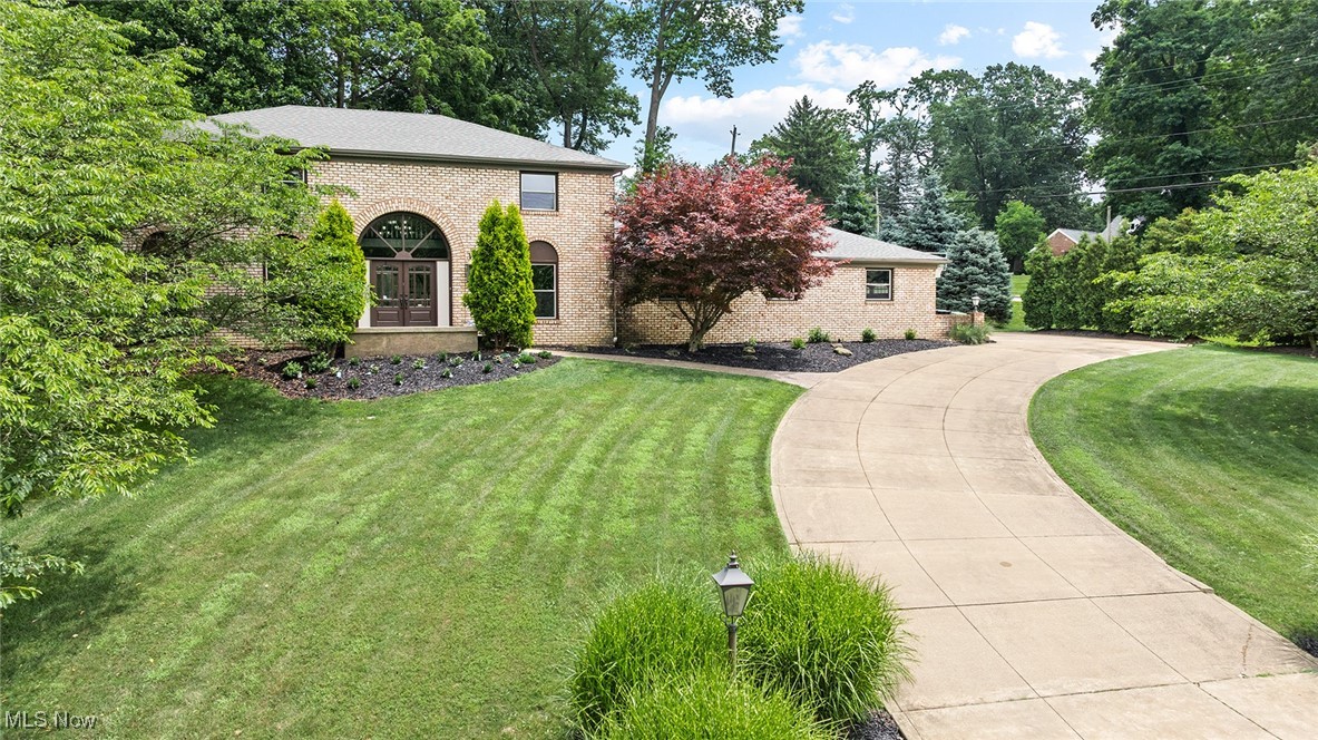 Location, Location, Location! Welcome to 3675 Country Club Dr.—a 5-bedroom, 3 full and 2 half bath stately brick colonial in the highly sought-after city of Silver Lake. This home is packed with elegant updates! Step inside to a gracious open foyer with a winding staircase leading to the second floor. The formal living and dining rooms feature new LVT flooring (2024), a widened threshold entry, and smooth ceilings throughout the main level. The chef’s dream kitchen—completely renovated in 2024–2025—boasts soft-close cabinetry with black hardware, granite countertops, an island, farmhouse sink with designer faucet, subway tile backsplash, upgraded lighting, GE commercial-grade gas range with range hood, café-style built-in refrigerator, GE dishwasher, and a beverage center with mini fridge. Just off the kitchen, you’ll find: A spacious family room with custom fireplace, recessed lighting, and double doors to the patio; an updated first-floor in-law/guest suite with a full bath; a large mudroom and laundry area with easy garage access.
Upstairs, the primary suite offers a glamorous spa-like bath with a large walk-in California Closet system, double vanity, soaking tub, and tiled shower. Three additional bedrooms and a full bath complete the second floor. The fully finished lower level—remodeled in 2021—features new LVT flooring, recessed lighting, fresh neutral paint, a barn door opening to the gym, and a refreshed half bath with new vanity, flooring, lighting, and commode. Outside, enjoy a stamped concrete patio perfect for entertaining, plus an upper yard with firepit—one of the best spots in Silver Lake to watch the fireworks! ROOF, 2yo. Residents also enjoy priority access to Crystal Lake Beach Club memberships. This timeless Silver Lake beauty blends classic architecture with modern luxury—ready for you to move right​​‌​​​​‌​‌​​​‌‌​​​‌‌‌​​‌​​‌‌​​​​ in!