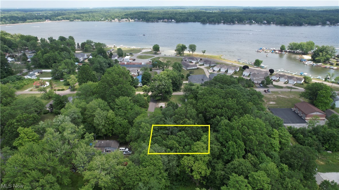 2 wooded vacant lots. 80 x 120 in total. All utilities at the street. Short walk to the beach. Call today to walk the land!! Lake Milton, Ohio’s 72nd State Park. Amphitheater, beach, swimming, fishing, boating, walking and jogging trails plus golf, wineries and shopping!!