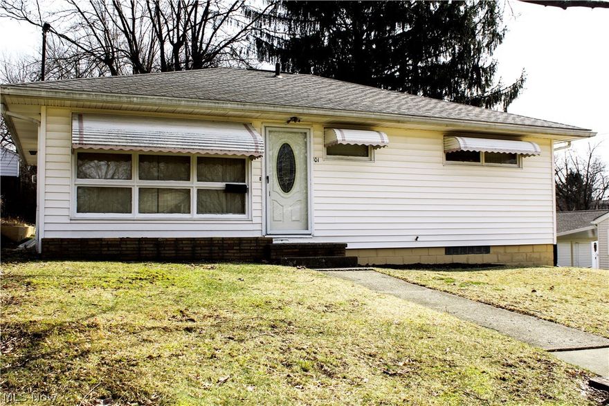 Welcome home to this great ranch on a double lot in the Ellet area of Akron. Brand new carpet (March 2019) throughout the first floor of the home. The living room has plenty of space to entertain and even has a small serving window from the kitchen. The large front window and back sliding door provide plenty of natural light throughout the day. The third bedroom was opened up and converted into a nice large dining room right next to the kitchen with a sliding door out to the back deck. The master bedroom provides great space to relax and it has 2 separate closets. There is even plenty of space in the basement that could be finished into an additional family room or media room and it walks directly out into the garage. The back yard offers plenty of shade under the mature trees and is also partially fenced in. The seller is also offering a 1 yr home warranty to the new owner of this home. Do not miss this one!
