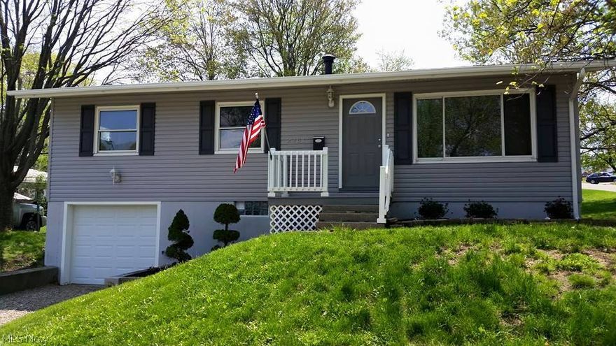 Completely renovated from top to bottom, NW Massillon. New in 2015- roof, siding, plumbing, electrical, 95 % high efficiency furnace and AC, hot water tank, tile floors, original, refinished hardwood floors, new kitchen with stainless steel appliances including dishwasher, microwave and disposal, backsplash, bar, countertops and cupboards, new doors throughout, new bathroom, glassblock windows, and so much more!