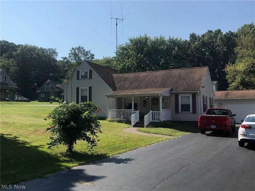 Charming and cozy home in Howland Township.  Nice corner lot, 2 car garage with garage door opener, shed, home features nice front porch, living room with gas fireplace, kitchen, dining room, upstairs has one bedroom and bath.  Walk up attic.  Newer windows, steel door, screen door.