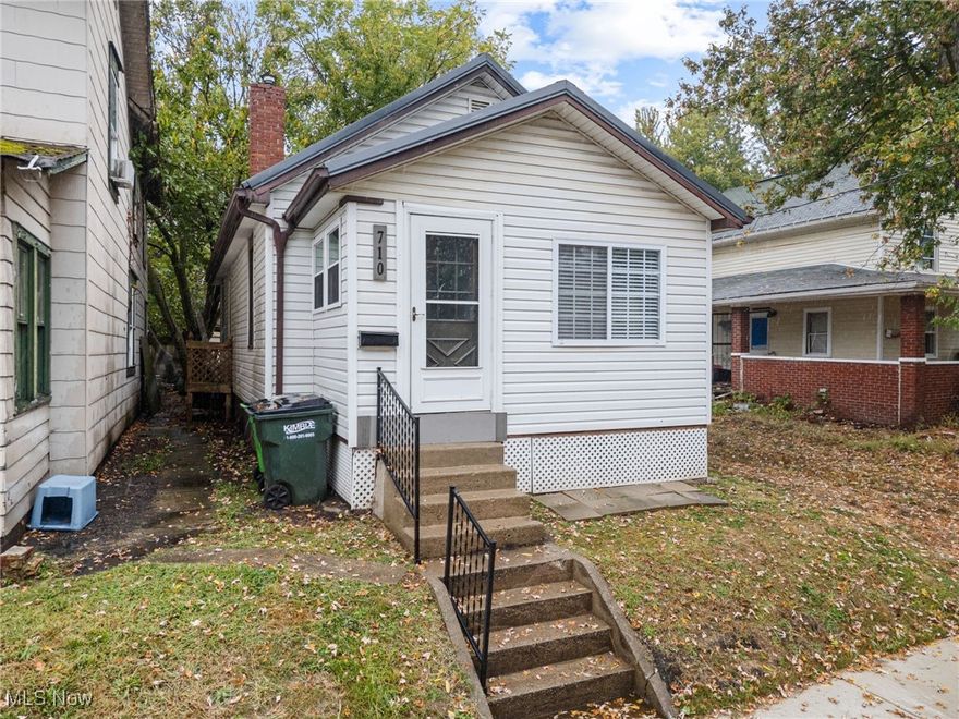 Fall in love with this cute as a button, tiny ranch home! The open-concept layout offers a bright, airy living space that flows into the kitchen—complete with a refrigerator, stove, microwave and plenty of pantry space. Just off the living room is a bonus area - perfect for a home office, reading nook, or playroom! Two cozy bedrooms and a full bath complete the main level, with a full basement below offering tons of storage! Many updates have been done in the last 2 years including: all-new flooring throughout, a new AC unit, professional air duct cleaning, enclosed mudroom, updated light fixtures, gutters and downspouts and new smoke detectors. Outside, the home offers an intimate backyard with a newer vinyl shed for convenient extra storage. This adorable home is ready for its next owner to move in and enjoy. For added peace of mind the sellers are including a 1 year home warranty for the new homeowners!