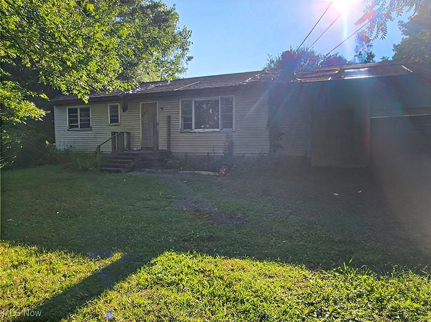 Handyman Special! Don’t miss this charming wooded property featuring 16+ acres and a cozy three-bedroom, one-bath home. Enjoy the best of both worlds with a peaceful country vibe while still being close to amenities and just minutes from Lake Erie. Come see the potential for yourself!