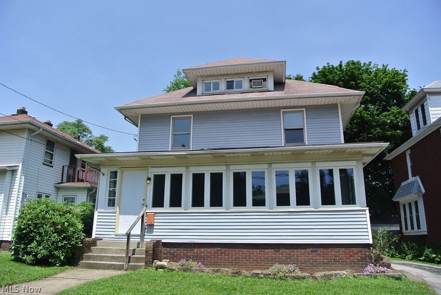 This property is set up as a two-unit (and has current zoning certification for legal use) has the potential for extended family living. First floor has beautiful oak floors and woodwork, solid oak sliding closet doors, and pocket doors with glass in them between LR & DR and between LR & Den. Den has fireplace centered on wall with built-in bookcases on both sides. Living room has fabulous beamed ceiling. Dining room has box window. First floor bedroom is at the rear. First floor full bath has footed tub with shower ring. FF kitchen has Kraftmaid Hickory cabinets, new counter, sink and flooring. Lots of new paint and carpet throughout. On the 2nd floor you'll find two large bedrooms, full bath, another dining room or multi-purpose room and a huge eat-in kitchen with loads of windows looking out to private backyard. The 2nd floor kitchen would make a lovely laundry room! The third floor is a private suite with a large walk-in closet (window ac unit stays). Step out the rear through a se
