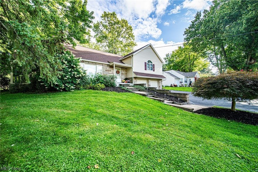 Spacious 4 level - Split offers 4 Bedroom 1.5 Bath in the Riverside Local School district.  Situated on a double lot just over 1 acre. HARDWOOD FLOORS  throughout the home under the carpet. Living Room/Dining/Eat In Kitchen and 3 Seasons Room all flow nicely on the main floor. 2 bedrooms and full bath with radiant heat on 2nd level. 2 additional bedrooms on the 3rd level. Utility Room. and additional bath with shower and sauna off garage. Bsmt with built- ins, bar, just needs to be finished out with flooring & ceiling. Property has city water and an old well. Updates Include: DRIVEWAY 2021*SIDING 2022*ROOF 2022*H20 2017*BOILER 2006*SEPTIC 2011. HOME WARRANTY