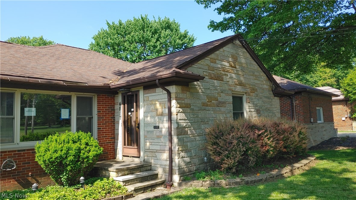 4817 Monticello Blvd Richmond Heights, OH 44143 is a newly remodeled Ranch home with 3 bedrooms & 2 full bathrooms w/ an En Suite Bathroom with a shower as well as the 2nd full main bath having tub shower combination. ONE FLOOR LIVING AT ITS BEST! Everything from Fresh paint to new floors & appliances have been professionally designed & completed. Home is ready to move in and start enjoying the new deck & fresh landscaping as Spring comes to Richmond Heights. This beautifully remodeled home is perfect for any family. The Primary bedroom includes new carpeting, an en suite PRIVATE bathroom, plenty of closets and windows on 2 walls of the room since it is a LARGE corner bedroom. There are 2 additional great sized bedrooms, also fresh and carpeted, and an additional full bathroom with combo tub & shower as well. You can just feel how fresh all the remodeling is and you'll be the first to enjoy it all! The Living Room is HUGE and has a gorgeous fireplace, entry foyer leads to covered front entry porch. The recreation room in the basement is huge & encompasses the entire rear half as a finished area and could be both a play room/rec rm & family room. Eat In Kitchen has a great layout and rear door to the newly installed rear deck that is covered, great for entertaining, listening to the birds and looking out into the huge rear yard with mature trees and fresh landscaping to enjoy. Plenty of concrete to have a grill and smoker for those weekend barbeques as well as ample parking! Plus a 2 car garage with plenty of storage space. Please understand, prospective applicants need to answer some vetting questions including providing income verification for full month of payroll stubs & fill in an online FREE application, link will be provided after initial questions are answered. No showings prior to answering the questions and the free application. Any pets at the discretion of the Landlord will require an additional pet deposit and pet fee. CMHA will not cover the full rent.