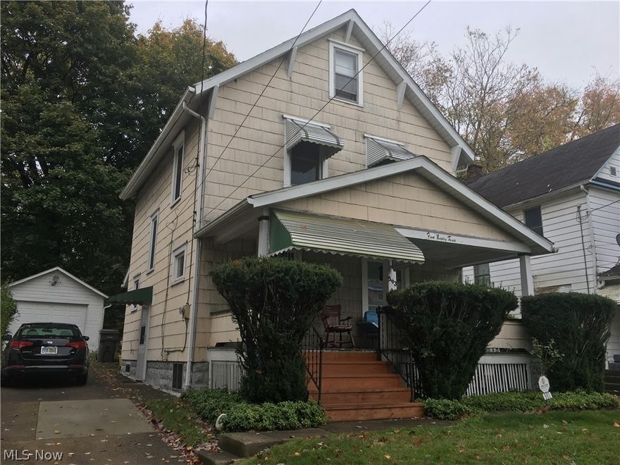 Great investment or starter on dead end street on the short East side of Youngstown.  Property is very close to YSU and would make excellent rental.  Long term owner since 1969!  Replacement windows.  Newer doors.  Eat in kitchen.  Nice size living and dining on first floor.  Big front porch.  3 bedrooms up with full walk up attic which could be renovated for additional bedroom.  1.5 car garage with opener.  Security system.  Very well priced as owner has moved out of state with family.  replat has been submitted to include lot behind see pictures.  This property is ready to move in or rent with some cleaning and minor maintenance!