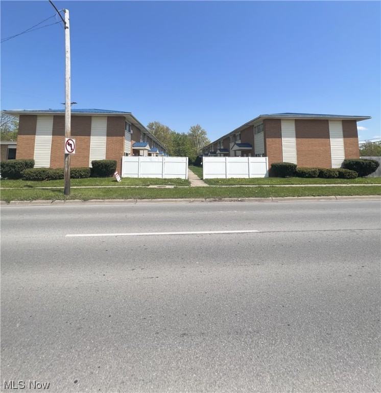 Unique opportunity to own apartment complex in suburban Elyria! This complex has had several unit renovations in 2022 and 2023. New flooring, paint, some fixtures, plumbing, finish work. Each unit has its own laundry room with hookups. 1.5 baths each unit. Each unit has its own parcel id number as well which could open the door for other development/renovation opportunities. Newer metal roof in last 5-7 years. Townhome style floorplan. 19- 2 bed units with 1 - 3 bed unit . 99% occupancy at present and rent increases along with a flat water fee of $75.00 has been implemented on all incoming tenants. Diverse mix of both traditional and Section 8 residency, thus limiting some of the risk. Privacy fencing and ample 26 space parking lot exist. Lorain Community College within 3 miles. Highway access 3-4 miles. Nearby retail/food/park. Elementary School right across the street. Rents coming in are at $800.00/month with flat $75 monthly water fee.